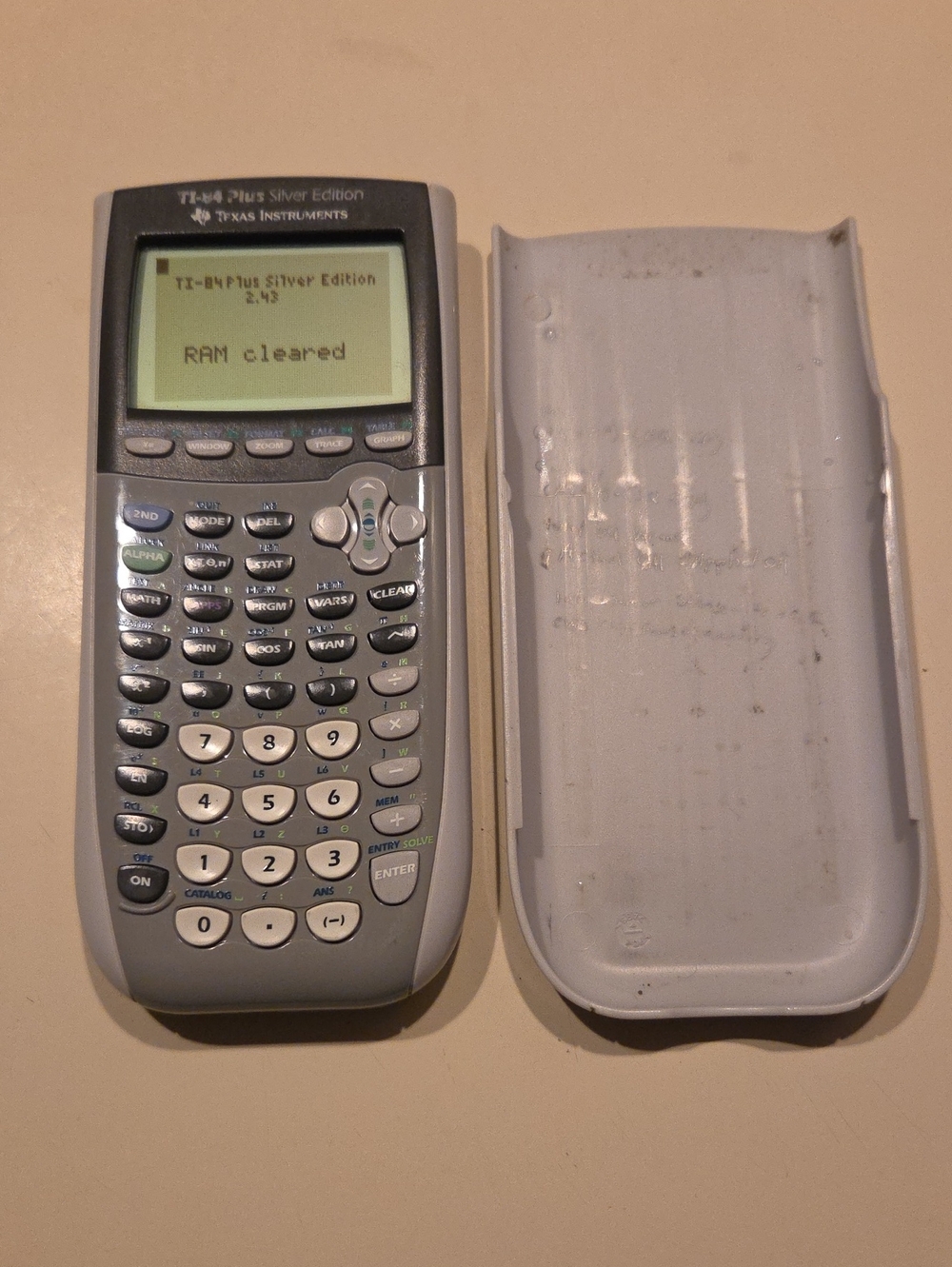 Texas Instruments TI-84 Silver Edition Graphing Calculator with Slide Cover